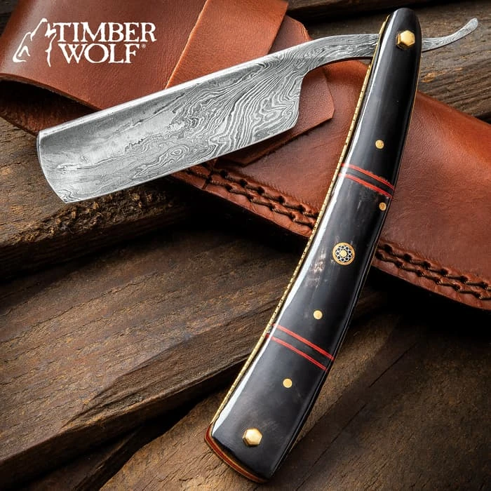 Timber Wolf Calcutta Folding Razor Knife And Sheath - Damascus Steel Blade, Bone Handle Scales, Brass Liners And Pins - Length 9 3/4” 1 Timber Wolf Calcutta Folding Razor Knife And Sheath - Damascus Steel Blade, Bone Handle Scales, Brass Liners And Pins - Length 9 3/4”